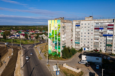 Самый масштабный мурал Сызрани украсил дом на новой набережной